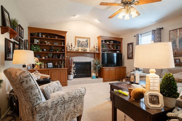 2321 Hayden Way, Normal, IL 61761 - living room with a tile fireplace, lofted ceiling, a ceiling fan, and carpet