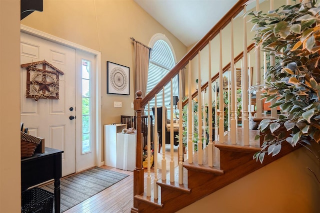 2321 Hayden Way, Normal, IL 61761 - entrance foyer with healthy amount of natural light, wood finished floors, stairway, and a towering ceiling