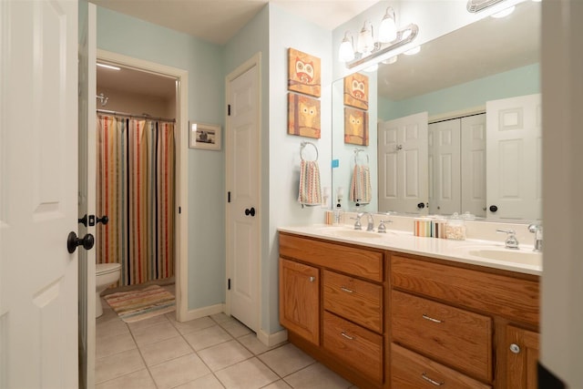 2321 Hayden Way, Normal, IL 61761 - bathroom featuring tile patterned floors and double vanity