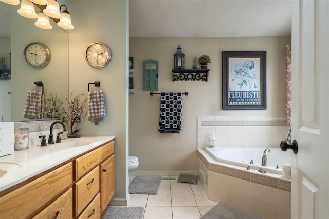 2321 Hayden Way, Normal, IL 61761 - bathroom with double vanity, a bath, tile patterned floors, and a chandelier