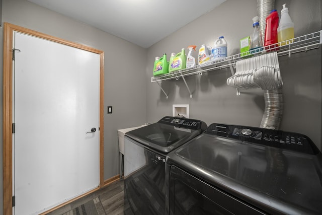 940 Hyte St, Plano, IL 60545 - washroom with washer and clothes dryer and dark wood-style flooring