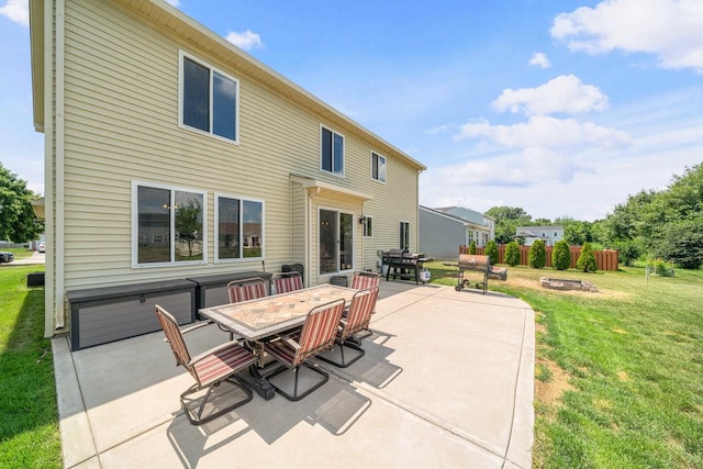 940 Hyte St, Plano, IL 60545 - view of patio featuring outdoor dining area and a fire pit