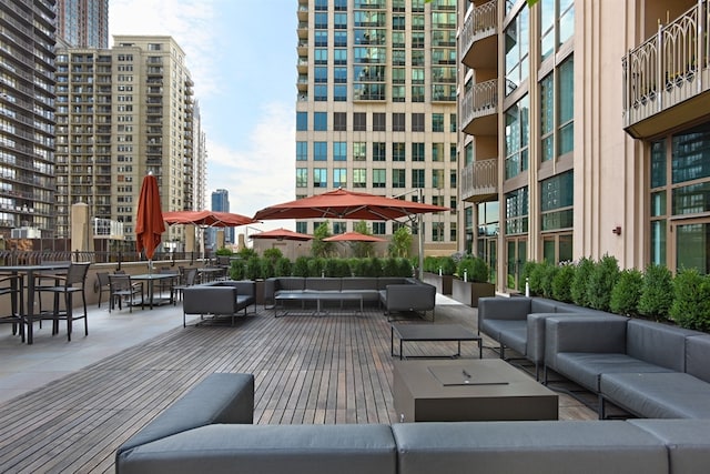 21 E Huron St Unit 1407, Chicago, IL 60611 - wooden terrace with an outdoor hangout area and a city view