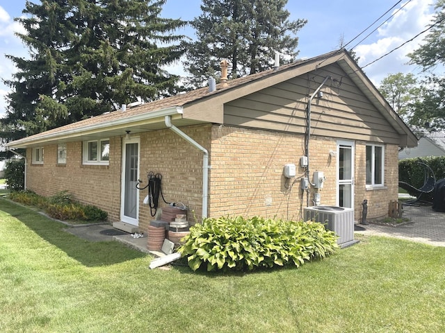 7401 W 113th Pl, Worth, IL 60482 - view of home's exterior with a yard and brick siding