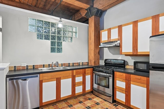 913 W Van Buren St Unit 5H, Chicago, IL 60607 - kitchen with appliances with stainless steel finishes, under cabinet range hood, a wood ceiling with exposed beams, and dark countertops