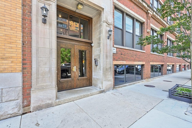 913 W Van Buren St Unit 5H, Chicago, IL 60607 - property entrance featuring brick siding and stone siding
