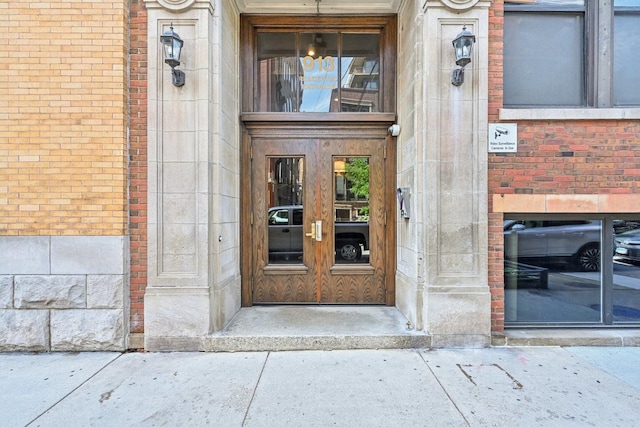 913 W Van Buren St Unit 5H, Chicago, IL 60607 - doorway to property with french doors and brick siding