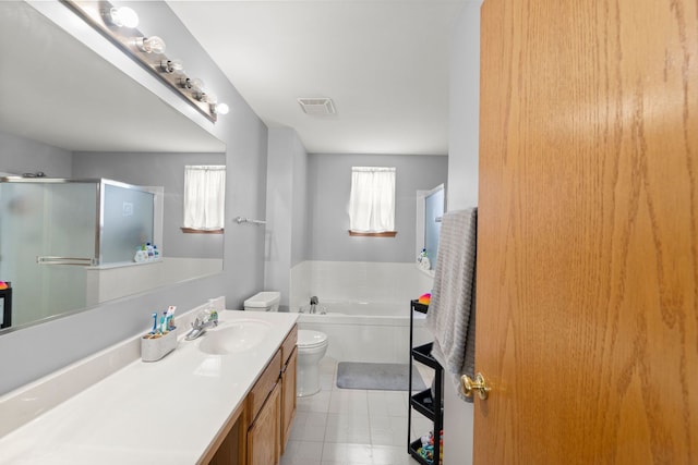 10931 Cape Cod Ln, Huntley, IL 60142 - full bath featuring vanity, a stall shower, a garden tub, and tile patterned floors