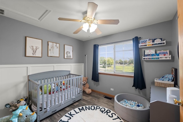 10931 Cape Cod Ln, Huntley, IL 60142 - bedroom with a crib, wood finished floors, and ceiling fan