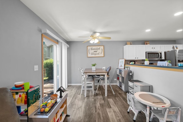 10931 Cape Cod Ln, Huntley, IL 60142 - dining space featuring a ceiling fan, wood finished floors, and recessed lighting