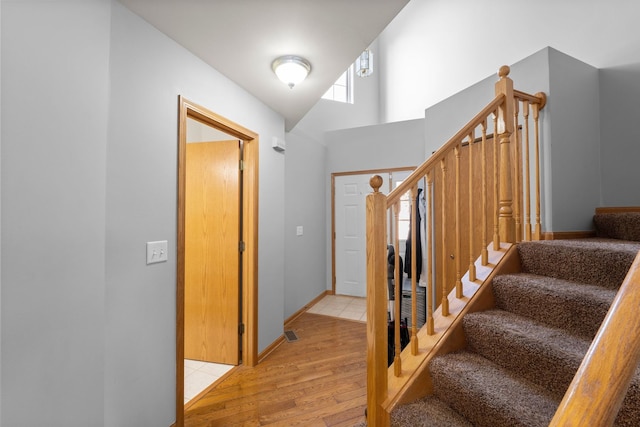 10931 Cape Cod Ln, Huntley, IL 60142 - staircase featuring wood finished floors and baseboards