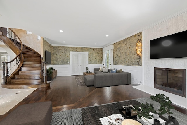 22 Westlake Dr, South Barrington, IL 60010 - living room featuring wallpapered walls, ornamental molding, stairs, wood finished floors, and wainscoting