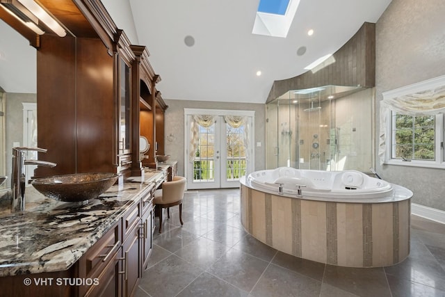 22 Westlake Dr, South Barrington, IL 60010 - bathroom with french doors, a shower stall, plenty of natural light, a tub with jets, and high vaulted ceiling