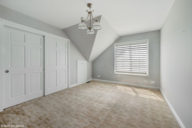 22 Westlake Dr, South Barrington, IL 60010 - bonus room featuring carpet floors, lofted ceiling, and a chandelier