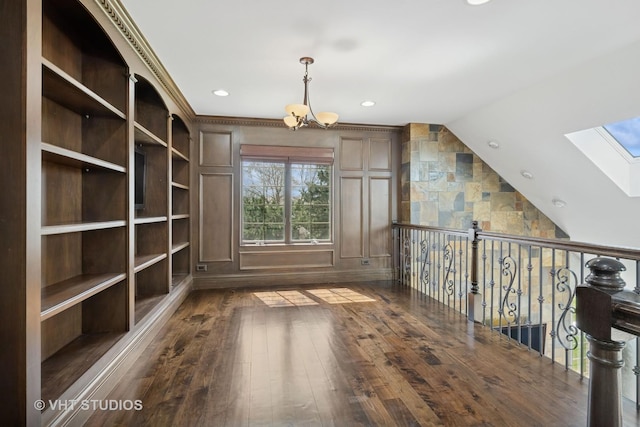 22 Westlake Dr, South Barrington, IL 60010 - interior space featuring a skylight, wood-type flooring, a chandelier, vaulted ceiling, and recessed lighting