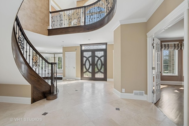 22 Westlake Dr, South Barrington, IL 60010 - entryway with stairs, healthy amount of natural light, crown molding, a towering ceiling, and tile patterned flooring