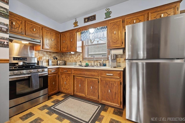 7007 W 110th St, Worth, IL 60482 - kitchen featuring appliances with stainless steel finishes, under cabinet range hood, light flooring, and light countertops