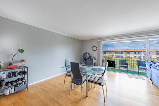 10354 Parkside Ave Unit 3A, Oak Lawn, IL 60453 - dining room featuring wood finished floors and crown molding