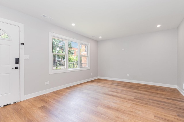 527 N Saint Louis Ave, Chicago, IL 60624 - entryway featuring light wood finished floors and recessed lighting