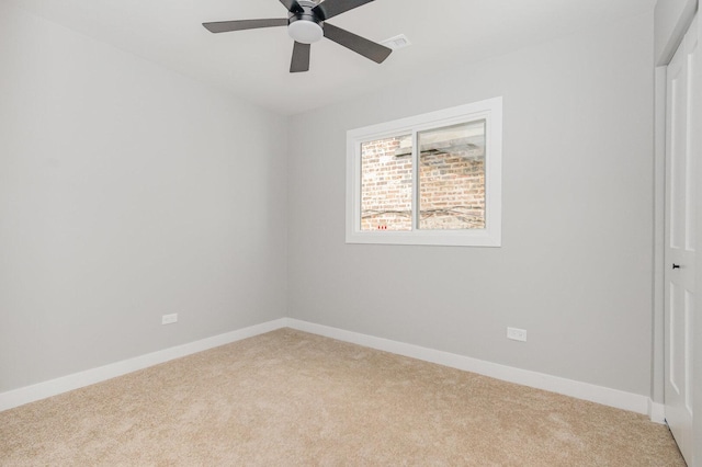 527 N Saint Louis Ave, Chicago, IL 60624 - empty room featuring light carpet and a ceiling fan