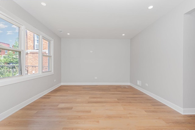 527 N Saint Louis Ave, Chicago, IL 60624 - empty room with recessed lighting and light wood-style flooring