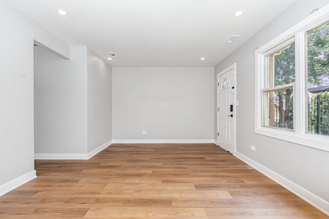 527 N Saint Louis Ave, Chicago, IL 60624 - entryway with recessed lighting and light wood-style floors