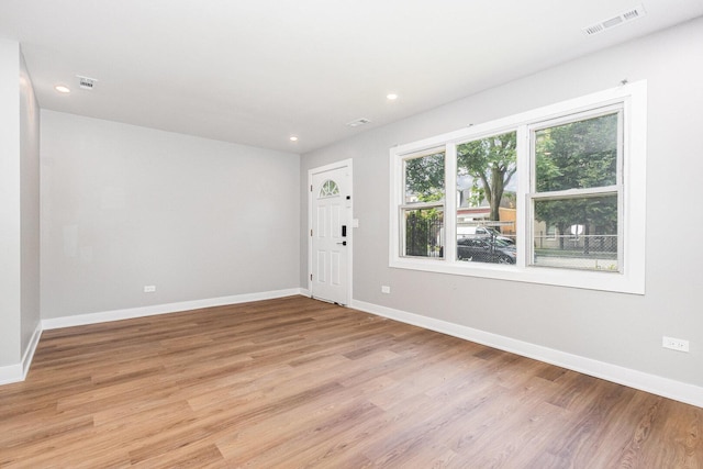 527 N Saint Louis Ave, Chicago, IL 60624 - foyer with light wood finished floors and recessed lighting