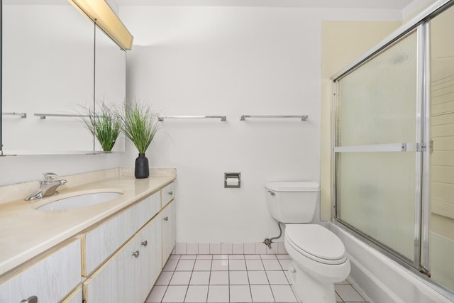 1475 Rebecca Dr Unit 311, Hoffman Estates, IL 60169 - bathroom with vanity, shower / bath combination with glass door, and tile patterned floors