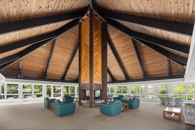 1475 Rebecca Dr Unit 311, Hoffman Estates, IL 60169 - carpeted living room with high vaulted ceiling and a wood ceiling with exposed beams