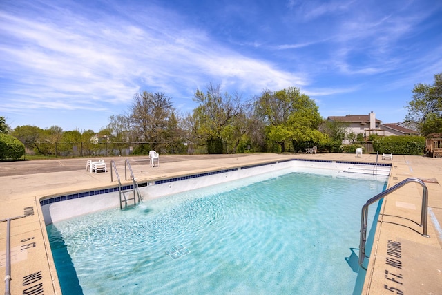 1475 Rebecca Dr Unit 311, Hoffman Estates, IL 60169 - community pool featuring a patio