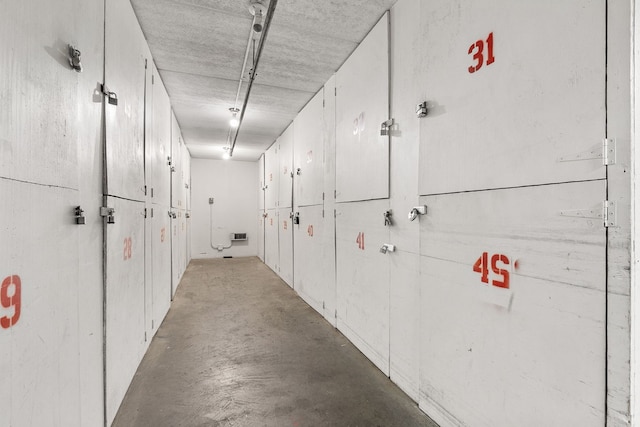 850 Des Plaines Ave Unit 405, Forest Park, IL 60130 - hallway featuring concrete floors