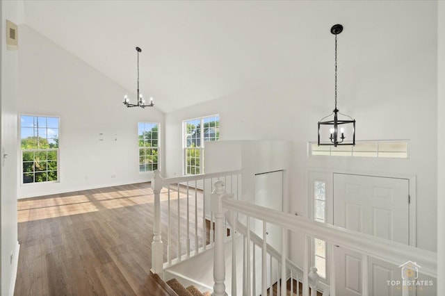 17437 Yakima Dr, Lockport, IL 60441 - corridor with a chandelier, high vaulted ceiling, wood finished floors, an upstairs landing, and healthy amount of natural light