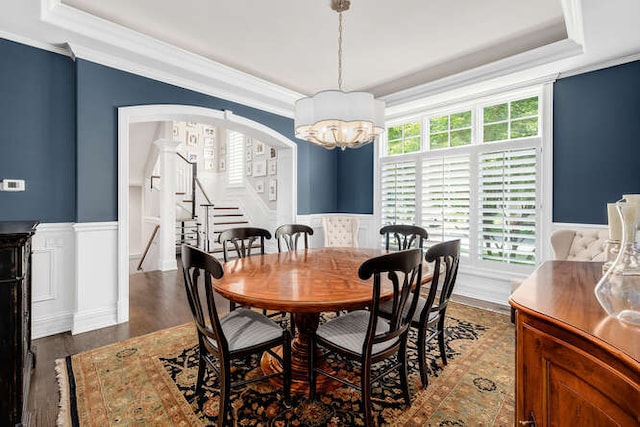 8 Willowcrest Dr, Oak Brook, IL 60523 - dining space featuring a raised ceiling, stairs, wainscoting, ornamental molding, and a chandelier