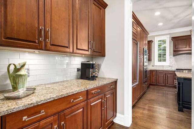 8 Willowcrest Dr, Oak Brook, IL 60523 - kitchen with light stone countertops, tasteful backsplash, stainless steel double oven, dark wood-style floors, and recessed lighting