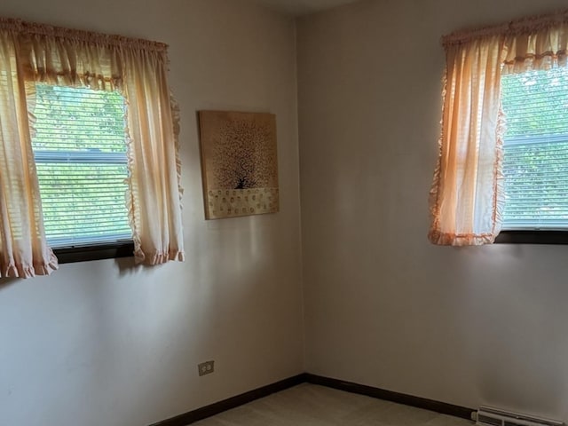 1S513 Chase Ave, Lombard, IL 60148 - unfurnished room featuring baseboard heating and baseboards