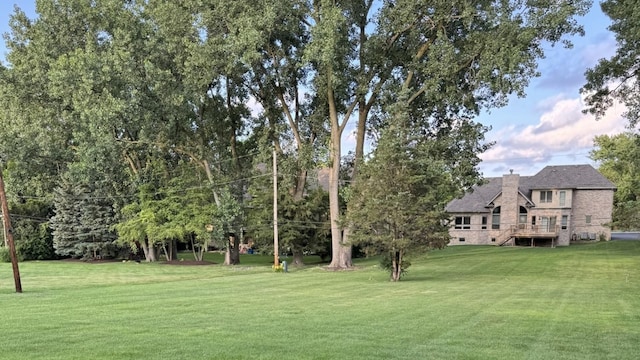 1S513 Chase Ave, Lombard, IL 60148 - view of grassy yard featuring a wooden deck