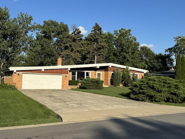 1S513 Chase Ave, Lombard, IL 60148 - view of front of house featuring a front lawn, an attached garage, driveway, and a chimney