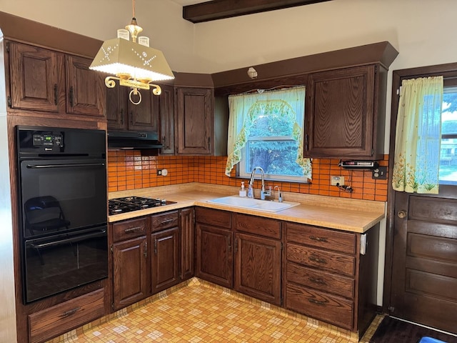 1S513 Chase Ave, Lombard, IL 60148 - kitchen with black appliances, under cabinet range hood, light countertops, and plenty of natural light