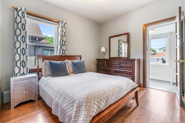 5240 W Eddy St, Chicago, IL 60641 - bedroom with wood finished floors and baseboards