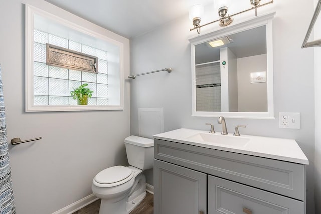 5240 W Eddy St, Chicago, IL 60641 - full bath with vanity, a shower with curtain, and wood finished floors