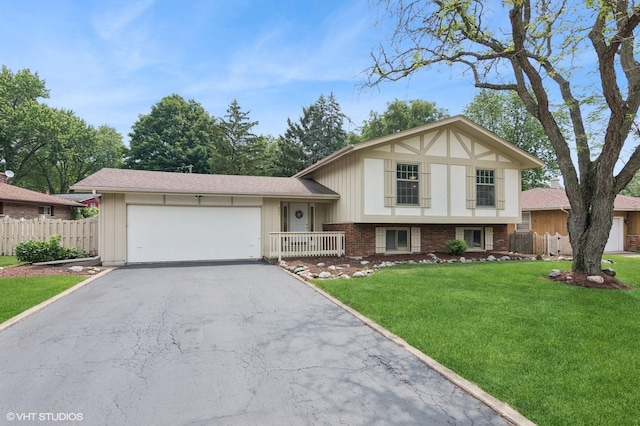 513 James Ct, Algonquin, IL 60102 - tri-level home featuring asphalt driveway and an attached garage