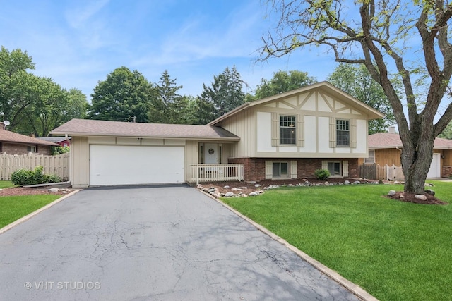 513 James Ct, Algonquin, IL 60102 - tri-level home with brick siding, an attached garage, and asphalt driveway