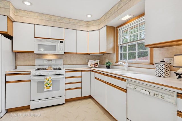 513 James Ct, Algonquin, IL 60102 - kitchen with white appliances, light countertops, white cabinets, backsplash, and recessed lighting