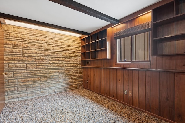 513 James Ct, Algonquin, IL 60102 - spare room featuring beam ceiling and wooden walls