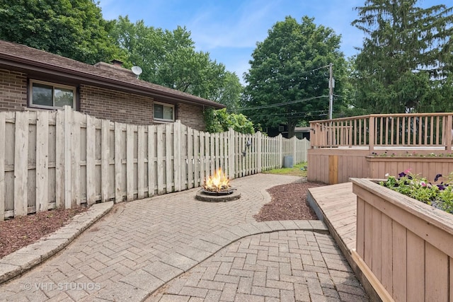 513 James Ct, Algonquin, IL 60102 - view of patio with a fire pit and a wooden deck