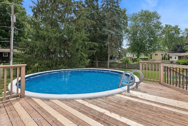 513 James Ct, Algonquin, IL 60102 - view of swimming pool with a fenced backyard and a deck