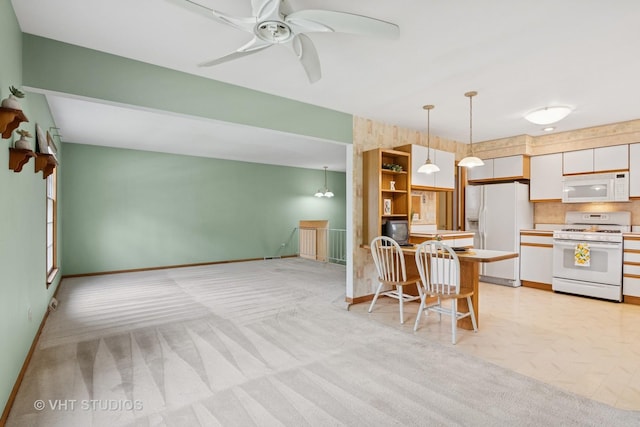 513 James Ct, Algonquin, IL 60102 - kitchen featuring white appliances, light carpet, open shelves, and ceiling fan