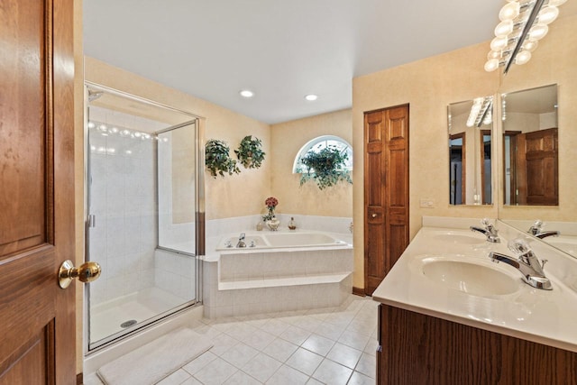 1450 Anvil Ct, Bartlett, IL 60103 - bathroom featuring a garden tub, tile patterned flooring, double vanity, a stall shower, and recessed lighting