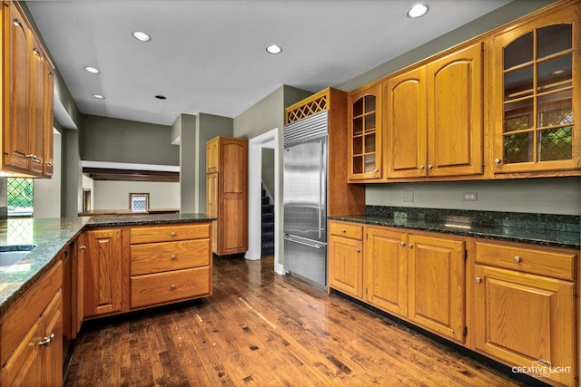 595 Crab Tree Ln, Lake Forest, IL 60045 - kitchen with built in fridge, dark wood-type flooring, brown cabinets, glass insert cabinets, and recessed lighting
