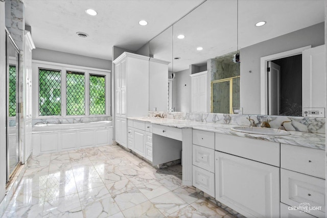 595 Crab Tree Ln, Lake Forest, IL 60045 - full bath featuring a stall shower, recessed lighting, double vanity, marble tiled floors, and a bath